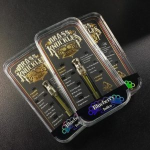 brass knuckles containing mango kush