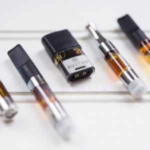 Alternative view of brass knuckles containing mango kush